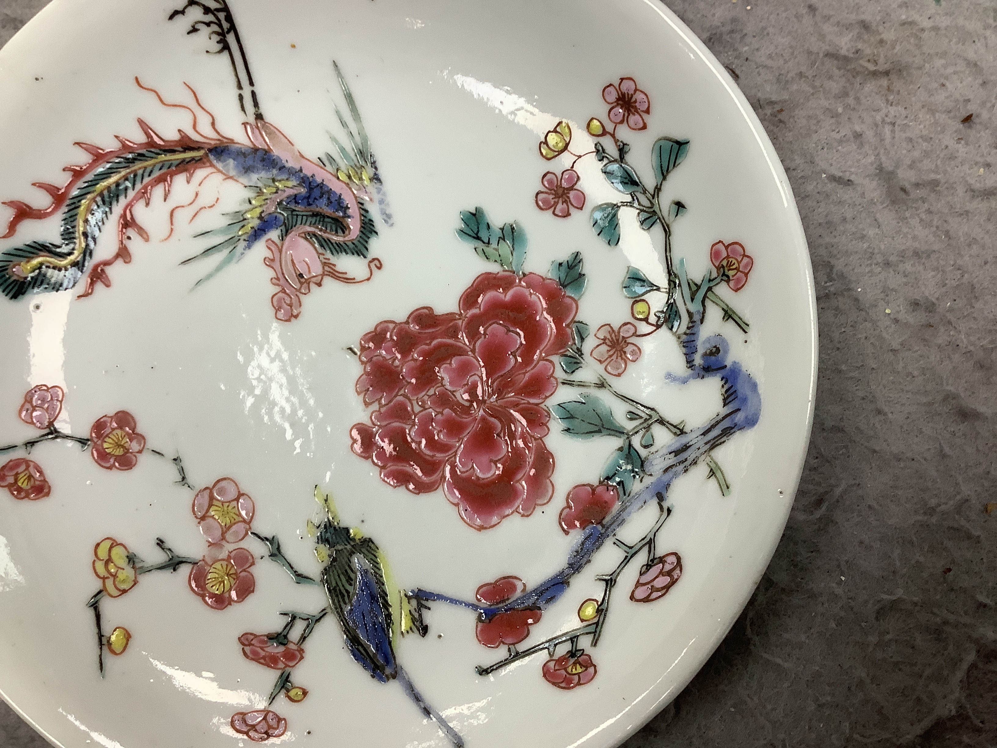 A Chinese famille rose fencai ‘phoenix and peony’ saucer dish, Yongzheng period, 10cm